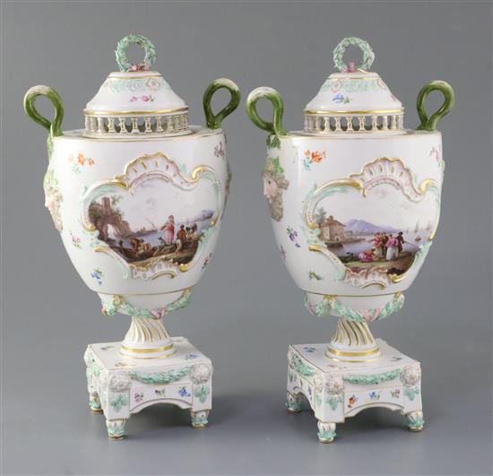 A pair of Meissen pot pourri vases and covers, late 19th century, height 32cm, some restoration